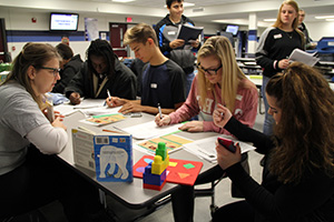 Students learning about real life budgeting Students learning about real life budgeting