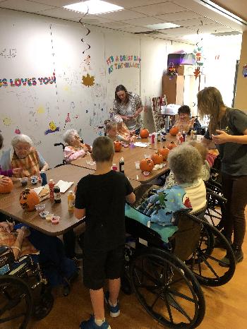 Village of East Harbor pumpkin painting